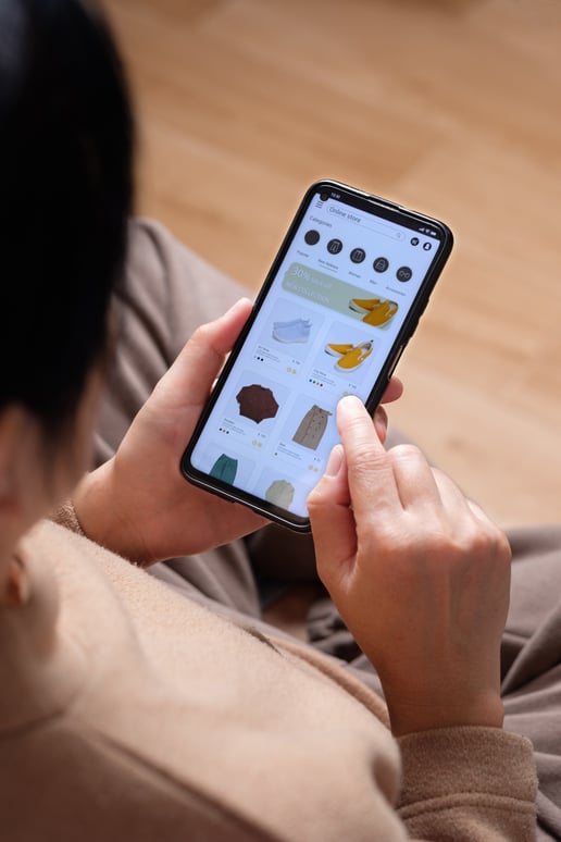 Hand Browsing Fashion App